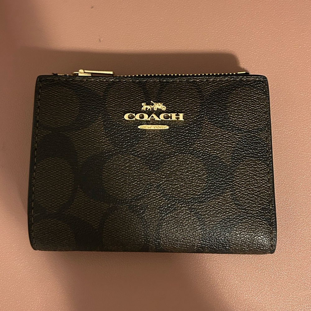 Coach bifold wallet in signature canvas